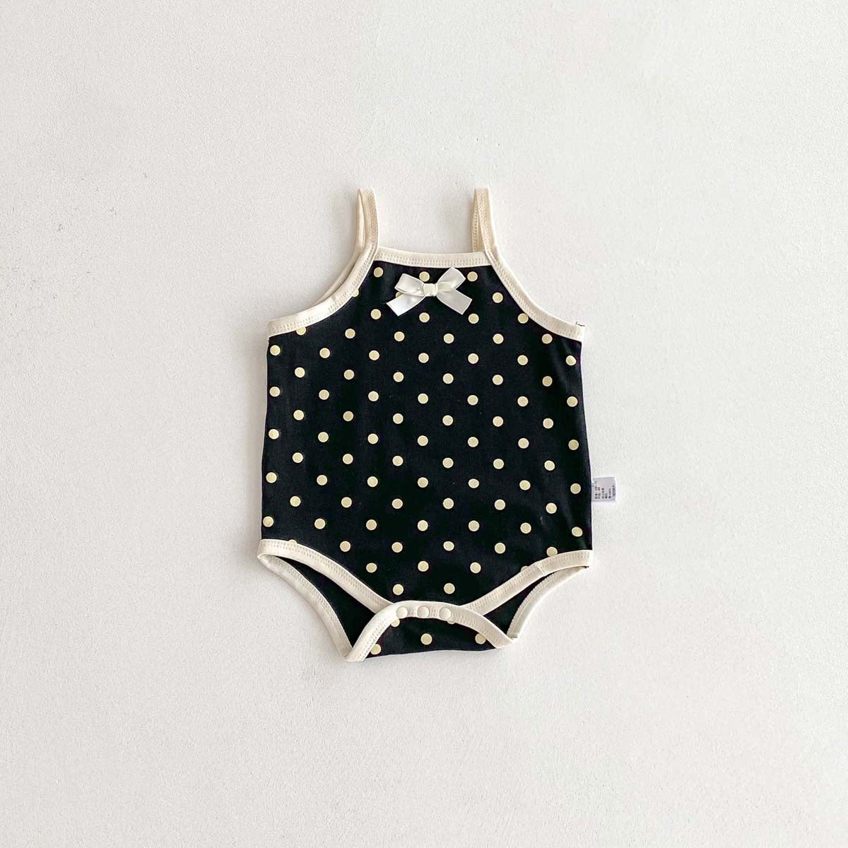 On Hand Millie Polka Onesie in Black