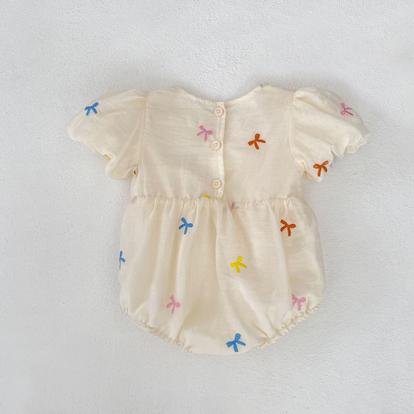 On Hand Clary Rainbow Romper in 0-6 months