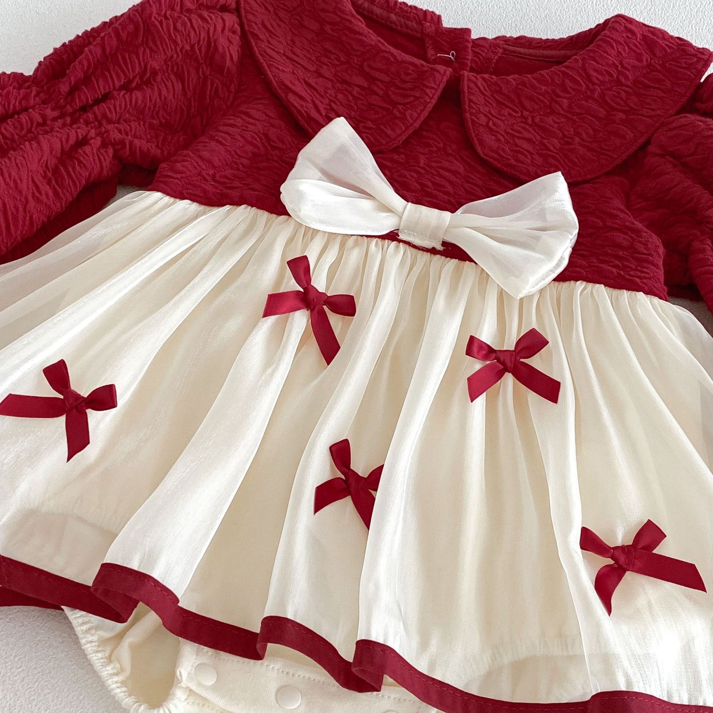 On Hand Tina Bow Romper