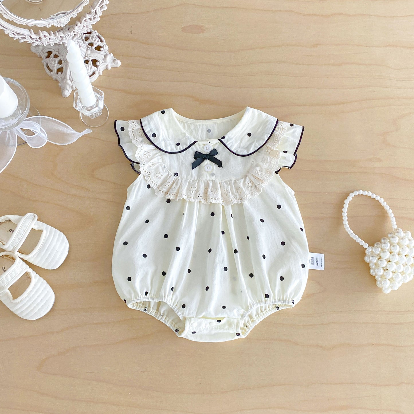 On Hand Jeanie Polkadot Romper in 0-6 months
