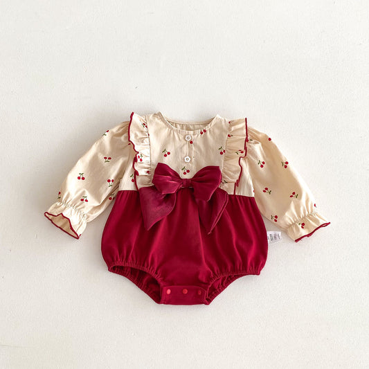 KATYA BOW ROMPER
